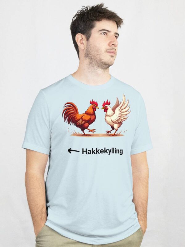 a man wearing a t-shirt with a picture of two chickens