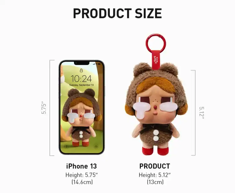 Labubu Crybaby Crying Again plysjfigur med brun lue ved siden av iPhone